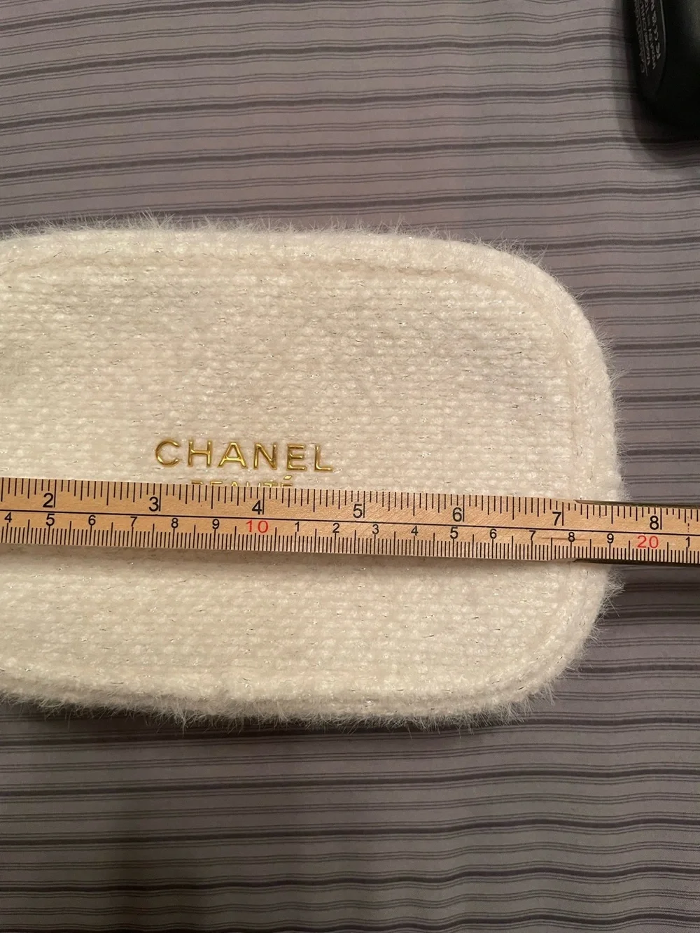 CHANEL white Faux-Fur makeup Case with Gold Logo